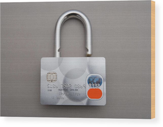 Debt Wood Print featuring the photograph Credit card lock by Image Source