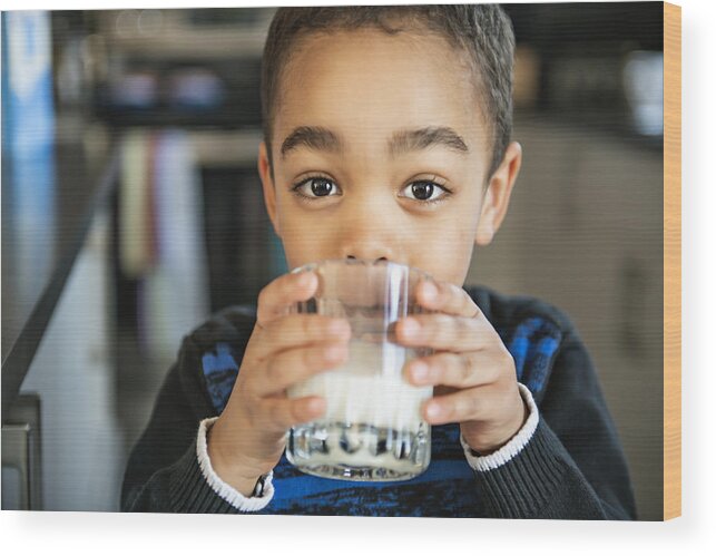 American Culture Wood Print featuring the photograph Cute African American boy drinking milk at home by LSOphoto