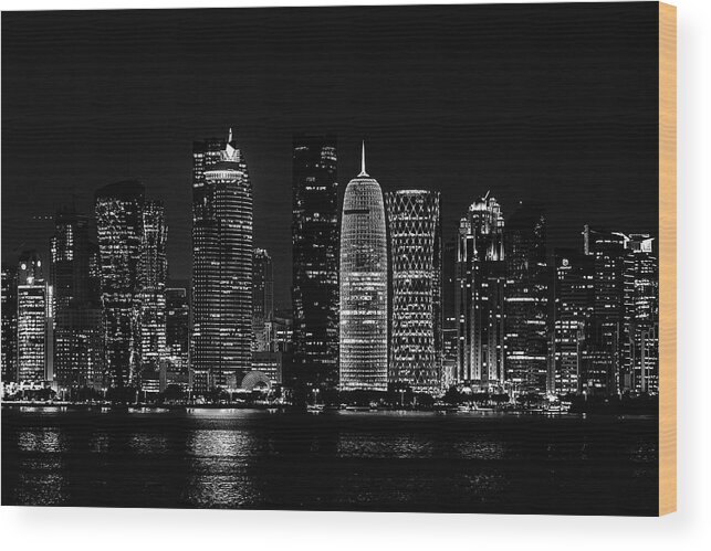 Yancho Sabev Photography Wood Print featuring the photograph Doha Skyline By Night in BW by Yancho Sabev Art