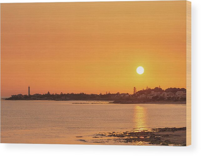 Sicily Wood Print featuring the photograph Enjoying an orange warm sunset over the sea in Sicily by Mirko Chessari