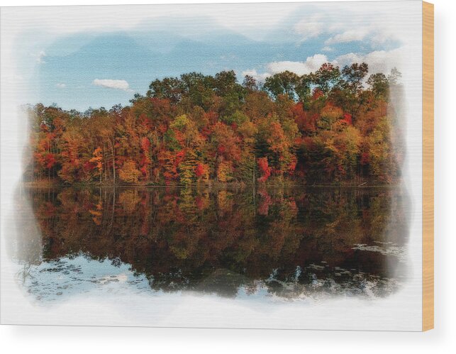 Fall Wood Print featuring the photograph Fall colors on the trees along a lake - paintography by Dan Friend