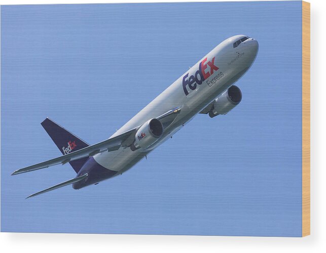 Fedex Wood Print featuring the photograph FedEx 767 by John Daly