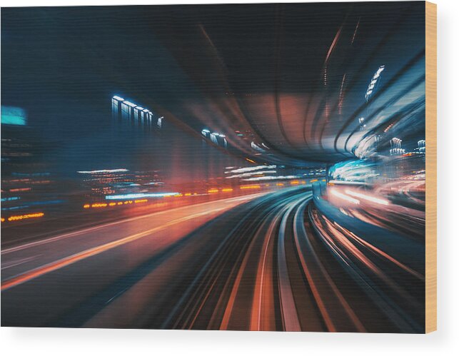 Rail Transportation Wood Print featuring the photograph Futuristic High Speed Light Tail with Night City Background by Nikada