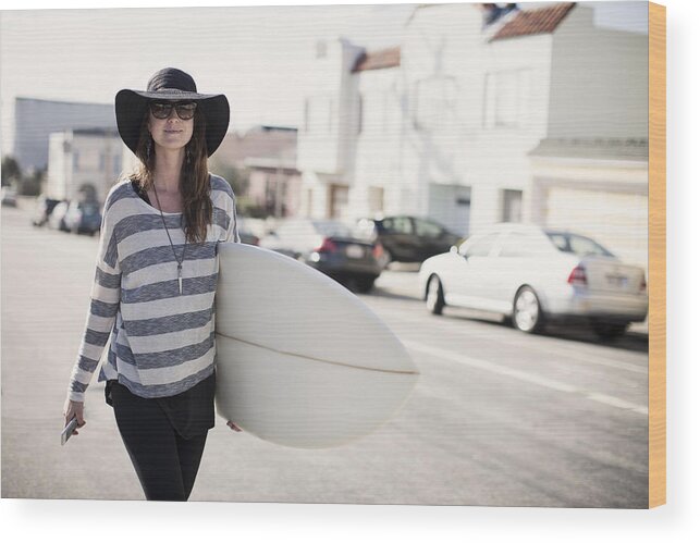 Mobile Phone Wood Print featuring the photograph Girl in black hat walking w/surfboard & cell phone by Justin Lewis