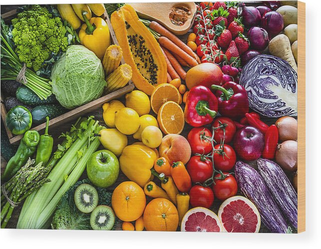 Broccoli Wood Print featuring the photograph Healthy fresh rainbow colored fruits and vegetables background by Fcafotodigital