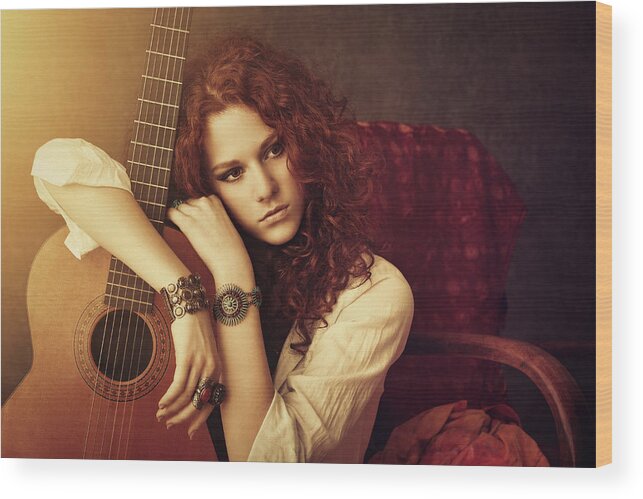 People Wood Print featuring the photograph Hippie Girl Embracing Her Acoustic Guitar by Mammuth