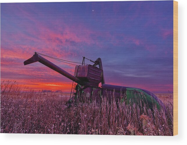 John Deere Wood Print featuring the photograph Hoping for Another Harvest - vintage John Deere combine before a ND sunrise by Peter Herman