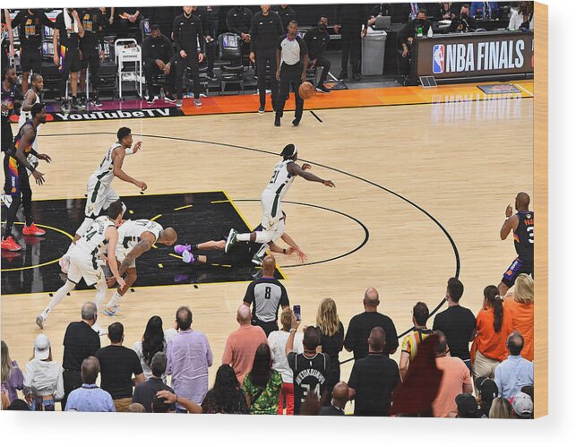 Jrue Holiday Wood Print featuring the photograph Jrue Holiday and Devin Booker by Jesse D. Garrabrant