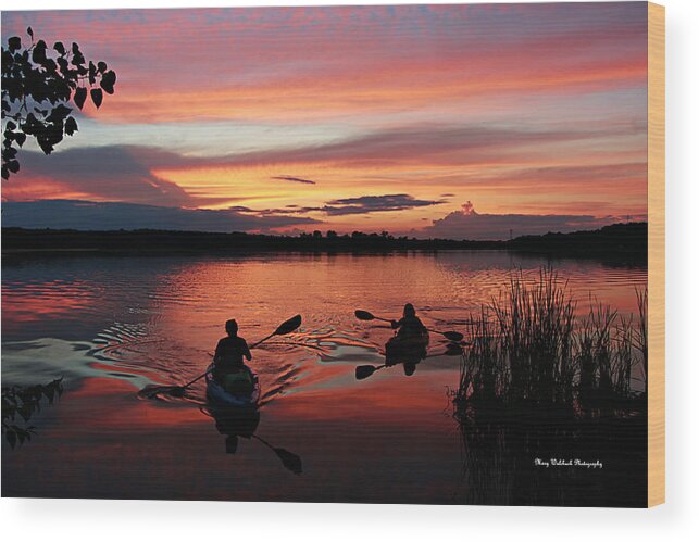 Kayaks At Beautiful Nimisila Reservoir In The City Of Green Wood Print featuring the photograph Kayaks at Red Sunset by Mary Walchuck
