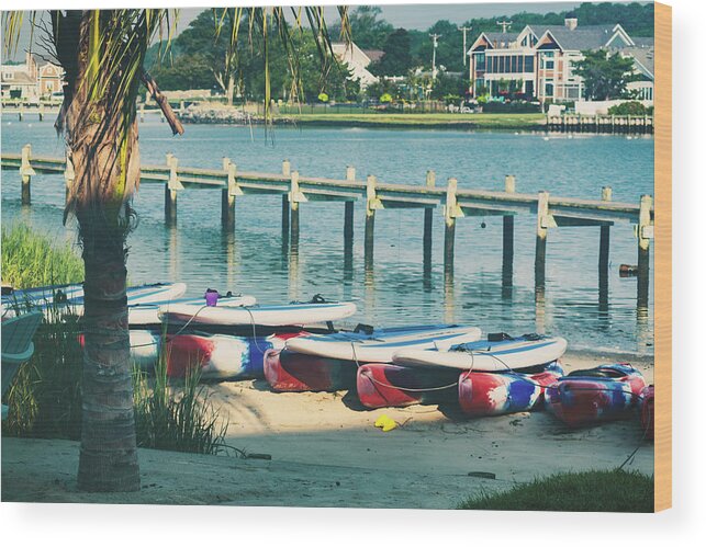 Kayaks Wood Print featuring the photograph Kayaks by the Pier - Rehoboth Bay by Jason Fink