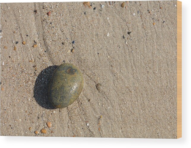 United Kingdom Wood Print featuring the photograph Lone pebble at low tide by Richard Donovan