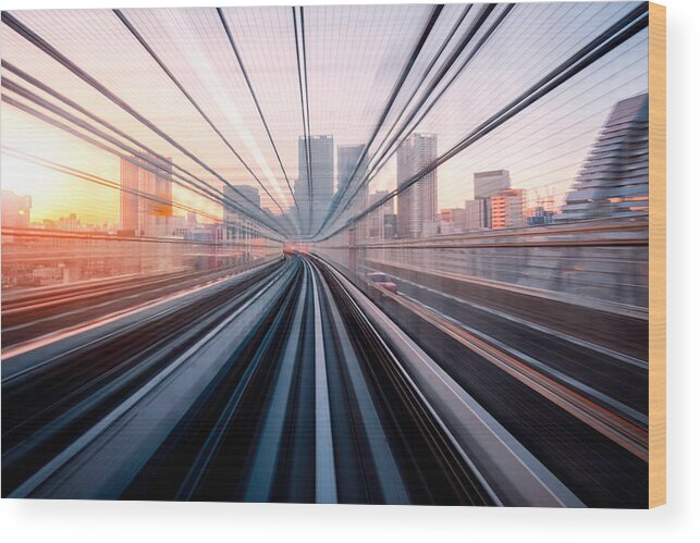 Downtown District Wood Print featuring the photograph Long exposure on Tokyo train, Japan by Wichianduangsri
