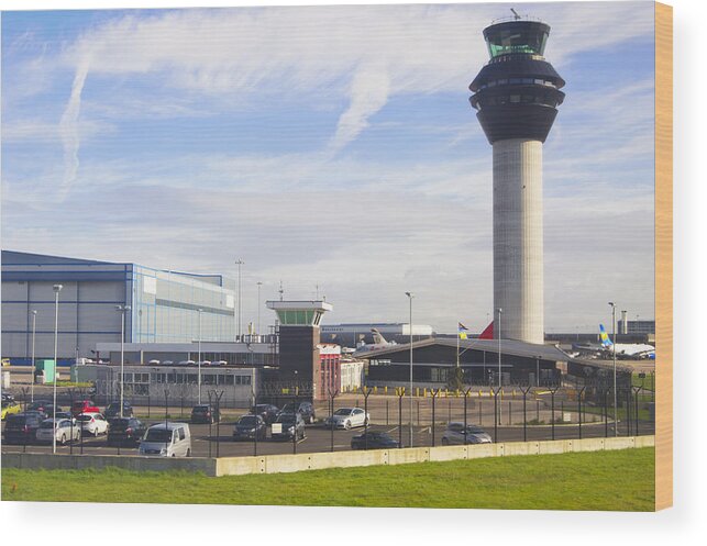 Tranquility Wood Print featuring the photograph Manchester airport. by Mark Williamson