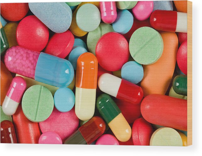 Orange Color Wood Print featuring the photograph Medicine Pills & Capsules by ShutterWorx