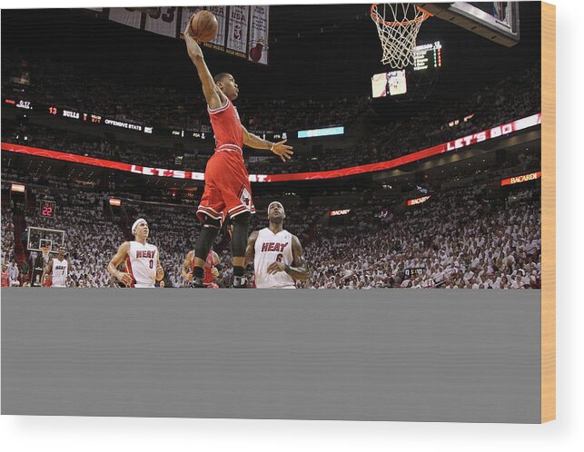 Chicago Bulls Wood Print featuring the photograph Mike Bibby, Derrick Rose, and Lebron James by Mike Ehrmann