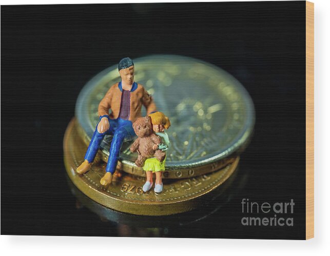Bond Wood Print featuring the photograph Miniature people Father and daughter share love. Macro by Pablo Avanzini