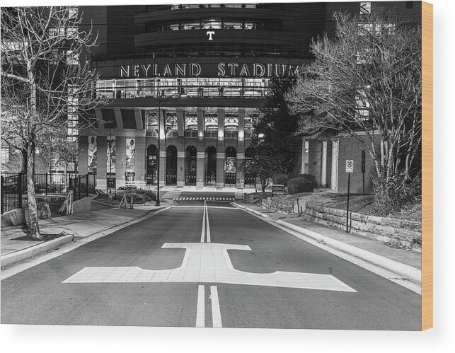 University Of Tennessee At Night Wood Print featuring the photograph Neyland Stadium at the University of Tennessee at night in black and white by Eldon McGraw