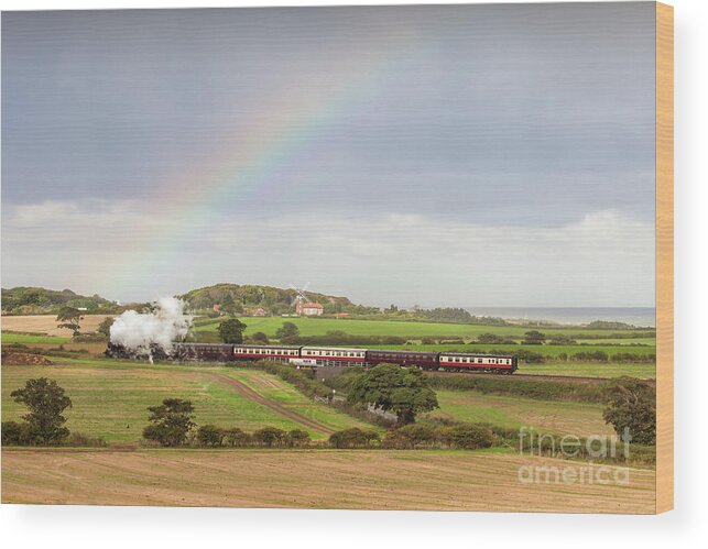 Weybourne Wood Print featuring the photograph Norfolk steam train with Weybourne windmill and rainbow by Simon Bratt