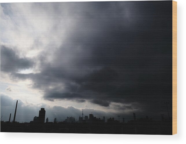City Wood Print featuring the photograph Ominous by Kreddible Trout