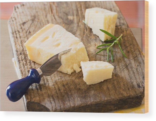 Cutting Board Wood Print featuring the photograph Parmesan and a cheese knife by Image Source