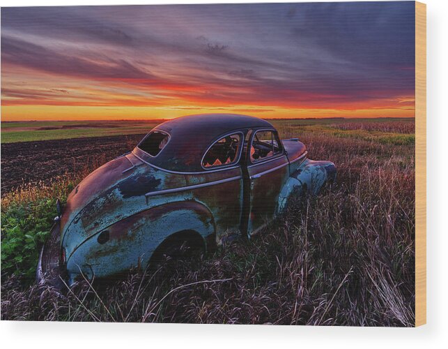 1947 Wood Print featuring the photograph Patina Perspectives Series - 5 of 6 1947 Chevy coup abandoned in ND field at sunrise by Peter Herman