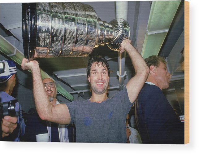 Playoffs Wood Print featuring the photograph Paul Coffey Hoists The Stanley Cup by B Bennett