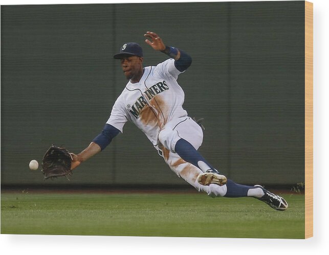 American League Baseball Wood Print featuring the photograph Raul Ibanez and James Jones by Otto Greule Jr