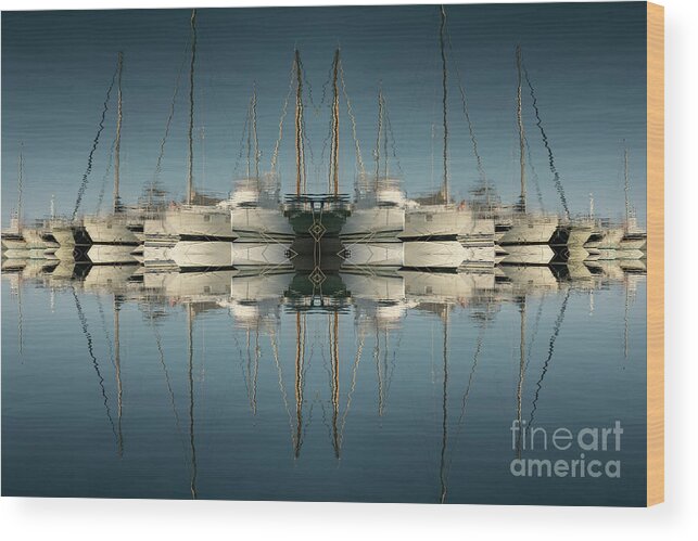 Mediterranean Wood Print featuring the photograph Reflections of sailboats in blue seawater by Adriana Mueller