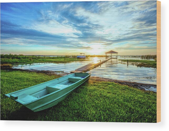 Docks Wood Print featuring the photograph Rowboat at the Water's Edge by Debra and Dave Vanderlaan