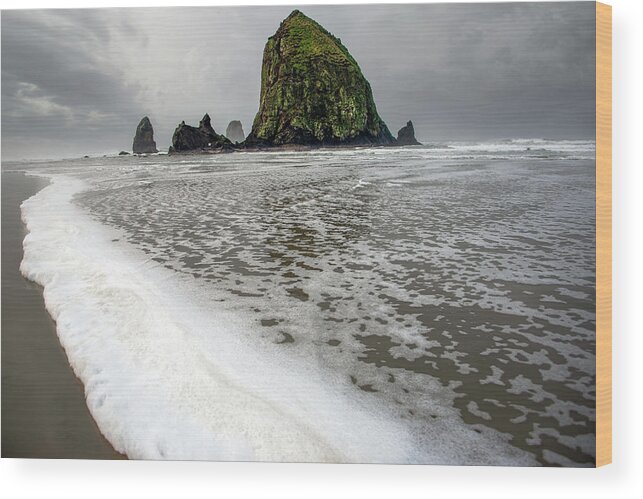 Cannon Beach Wood Print featuring the photograph Seafoam at Cannon Beach by Jerry Cahill