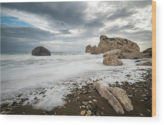 Seascape Wood Print featuring the photograph Seascape with windy waves splashing at the rocky coastal area. by Michalakis Ppalis