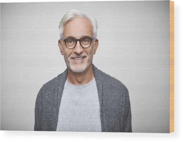 New Business Wood Print featuring the photograph Senior owner wearing eyeglasses and smart casuals by Morsa Images