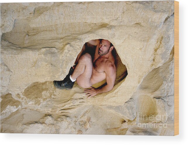 Abs Wood Print featuring the photograph Sexy nude male hiding in a sand cave by Gunther Allen