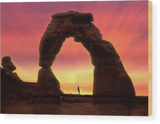 Southwest Wood Print featuring the photograph Silhouette of Delicate Arch by Mike McGlothlen