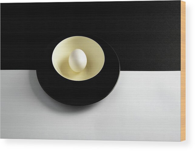 Still-life Wood Print featuring the photograph Single fresh white egg on a yellow bowl by Michalakis Ppalis