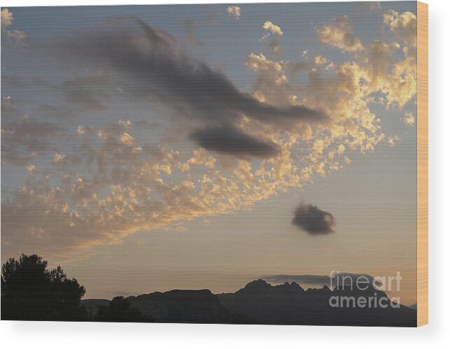 Clouds Wood Print featuring the photograph Soft clouds hovering over the Sierra de Bernia mountain range by Adriana Mueller