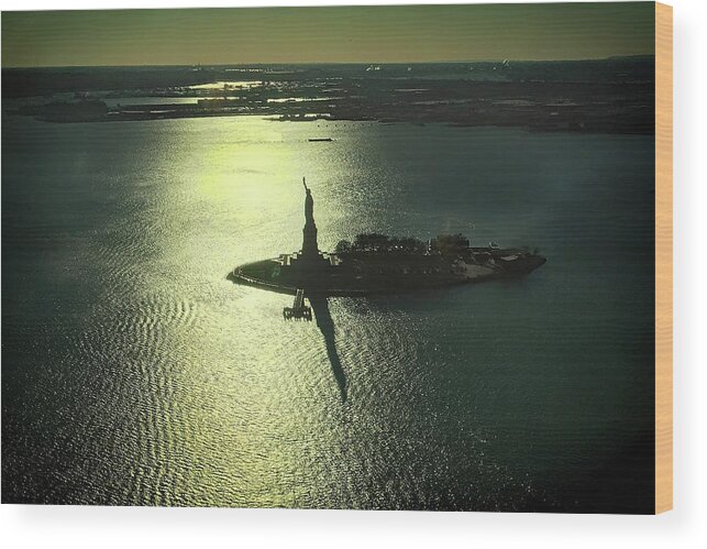 Statue Of Liberty Wood Print featuring the photograph Statue of Liberty Silhouette by Bill Swartwout