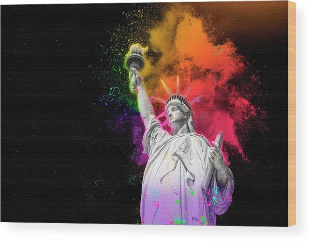 Statue Of Liberty Wood Print featuring the digital art Statue of Liberty with colorful rainbow holi paint powder explosion isolated on black background by Maria Kray