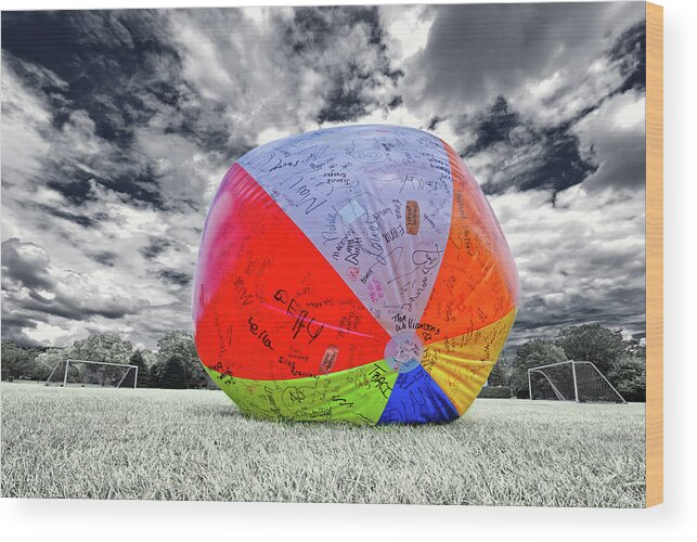 Roly Poly Ole Wood Print featuring the photograph Stoughton's famous Roly Poly Ole wandering beach ball at the Virgin Lake soccer field by Peter Herman