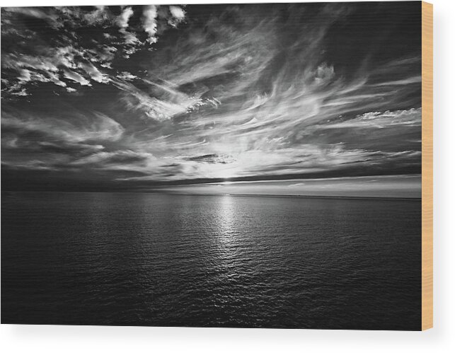 Sunset Wood Print featuring the photograph Sunset on the horizon at sea by Bernhard Schaffer
