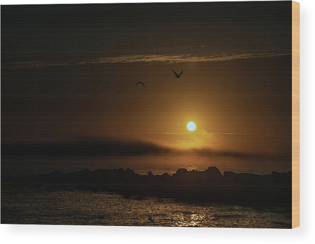 Sunset Wood Print featuring the photograph Sunset over the ocean by Micah Offman