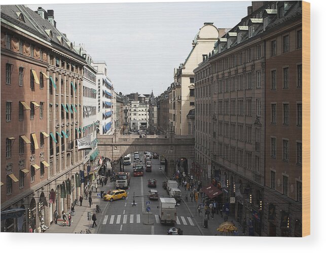 Sweden Wood Print featuring the photograph Sweden, Stockholm, Traffic on street with buildings by Matt Henry Gunther