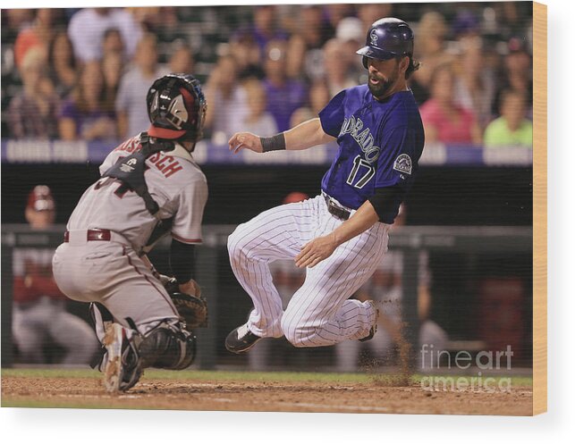 Baseball Catcher Wood Print featuring the photograph Todd Helton and Jordan Pacheco by Doug Pensinger