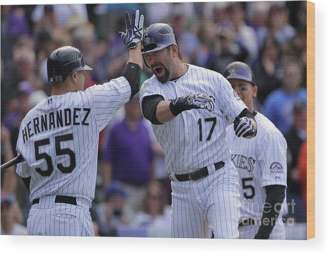 Relief Pitcher Wood Print featuring the photograph Todd Helton and Ramon Hernandez by Doug Pensinger