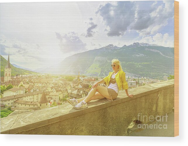 Switzerland Wood Print featuring the photograph tourist by Chur sunset skyline in Switzerland by Benny Marty