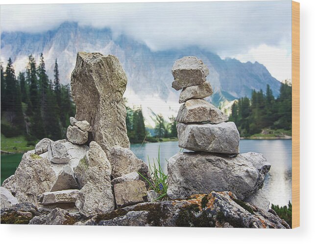 Two Wood Print featuring the photograph Two stone towers as route markers. by Bernhard Schaffer