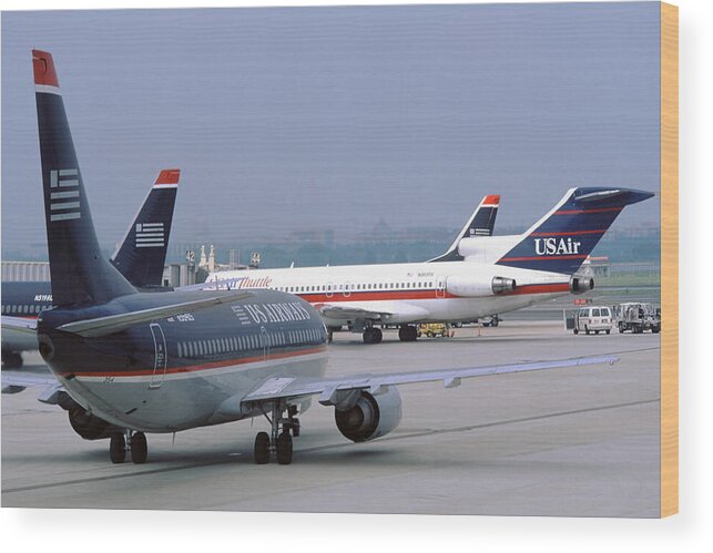 Us Airways Wood Print featuring the photograph US Airways Boeing 737s at Washington Reagan Airport by Erik Simonsen