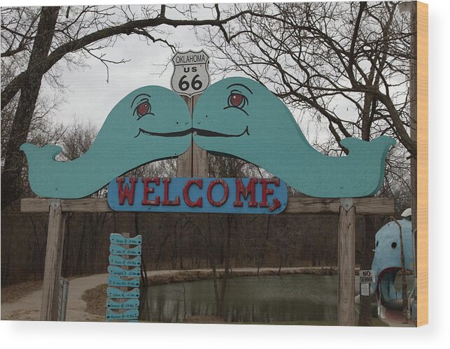 Route 66 Roadside Attraction Wood Print featuring the photograph Welcome sign for the Blue Whale of Catoosa Oklahoma on Historic Route 66 by Eldon McGraw