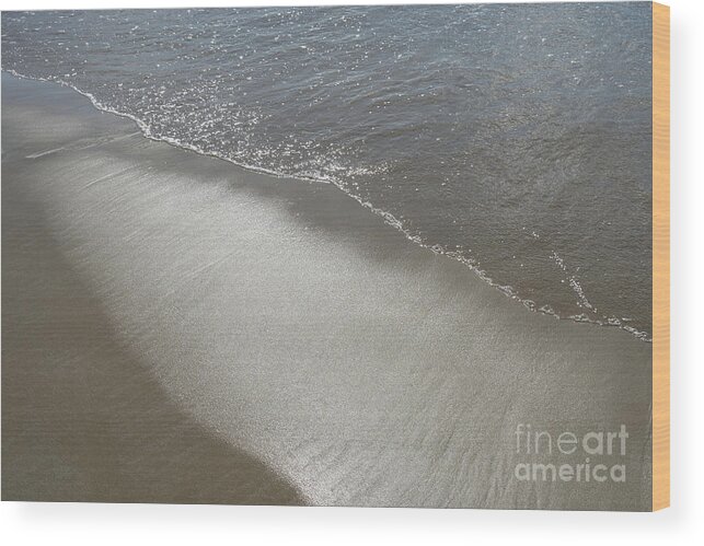 Sandy Beach Wood Print featuring the photograph Wet sand, sea water and reflections of sunlight 2 by Adriana Mueller
