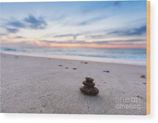Zen Wood Print featuring the photograph Zen stones on calm beach at sunset by Michal Bednarek